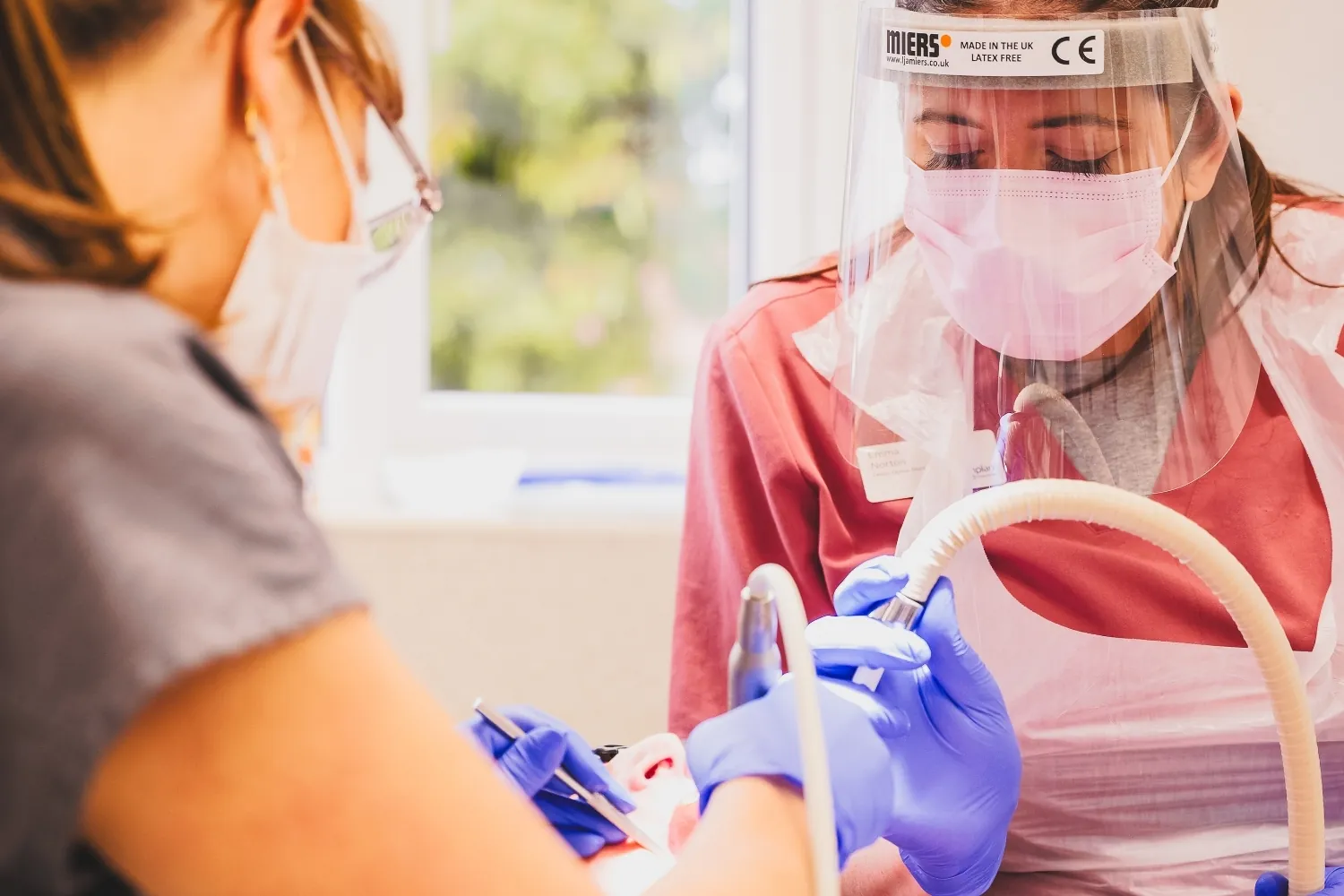 Dental nurse working chairside at New Road Dental Bromsgrove