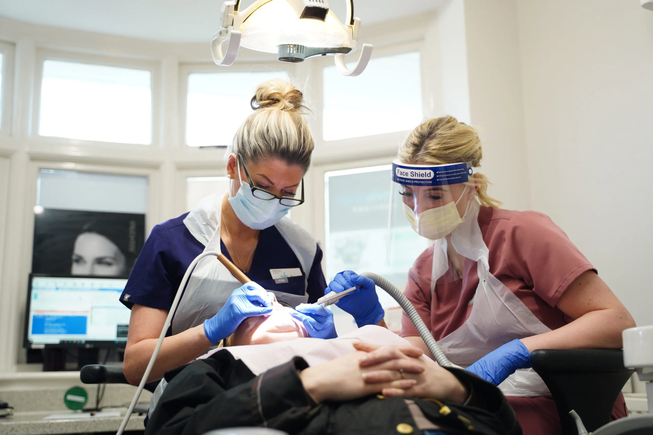 New Road Dental hygienist with patient in Bromsgrove