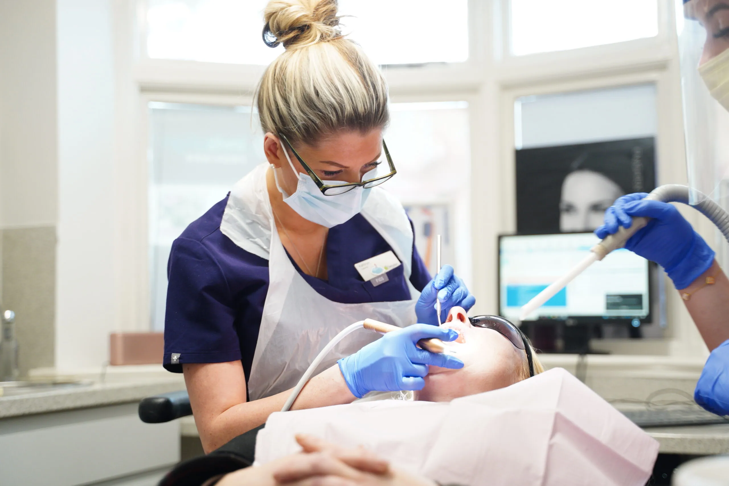 Dental hygienist at work at New Road Dental practice Bromsgrove