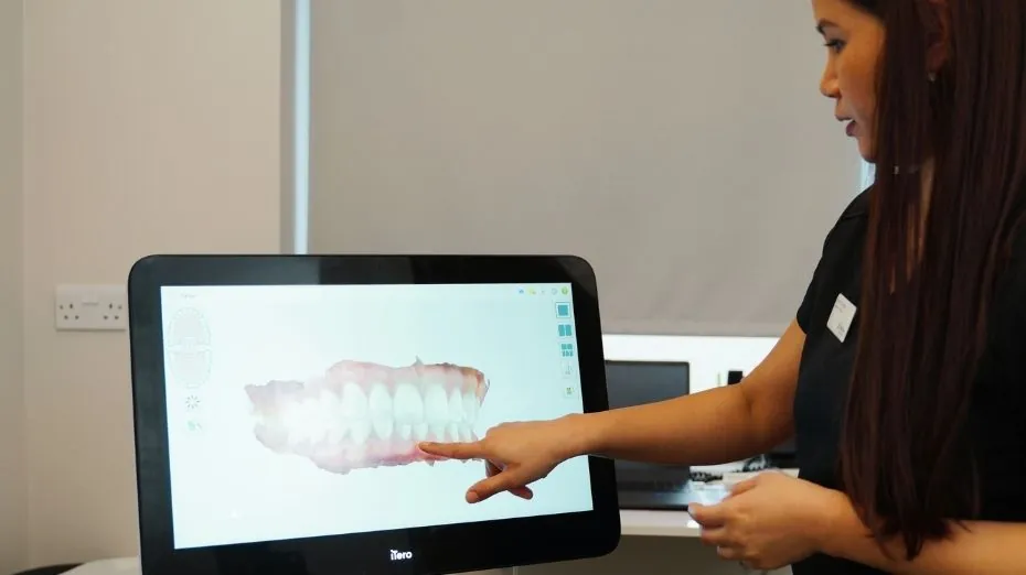 Dentist consulting with a patient at New Road Dental Bromsgrove